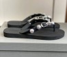 Женские резиновые шлепанцы Balenciaga черные с металлическими украшениями 2025