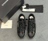 Женские комбинированные кроссовки Chanel черные глянцевые 2025