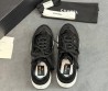 Женские комбинированные кроссовки Chanel черные глянцевые 2025