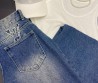 Женские джинсы Louis Vuitton синие с монограммами 2025