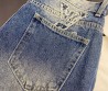 Женские джинсы Louis Vuitton синие с монограммами 2025