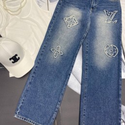 Женские джинсы Louis Vuitton синие с монограммами 2025