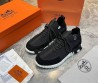 Мужские текстильные кроссовки Hermes черные с замшевыми элементами 2025