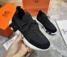 Мужские текстильные кроссовки Hermes черные с замшевыми элементами 2025
