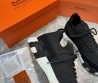 Мужские текстильные кроссовки Hermes черные с замшевыми элементами 2025