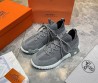 Мужские текстильные кроссовки Hermes серые с замшевыми элементами 2025