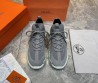 Мужские текстильные кроссовки Hermes серые с замшевыми элементами 2025