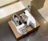 Мужские текстильные кроссовки Burberry бежевые с черным в клетку 2025