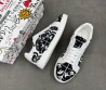 Мужские текстильные кеды Dolce & Gabbana белые с черными узорами 2025
