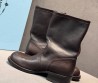 Женские кожаные укороченные сапоги Prada коричневые с пряжкой 2025