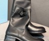 Женские кожаные укороченные сапоги Prada черные с пряжкой 2025
