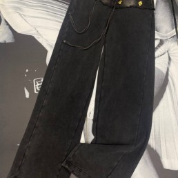 Женские джинсы Schiaparelli черные с золотыми украшениями на поясе 2025