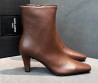 Женские кожаные ботильоны Saint Laurent Jill коричневые каблук 7 см 2025