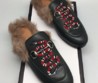 Женские кожаные мюли с мехом Gucci зеленые