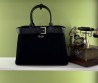 Женская замшевая сумка Prada черная с кожаными элементами 33х23 2025