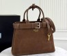 Женская замшевая сумка Prada коричневая с кожаными элементами 33х23 2025