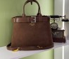 Женская замшевая сумка Prada коричневая с кожаными элементами 33х23 2025