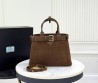 Женская замшевая сумка Prada коричневая с кожаными элементами 33х23 2025