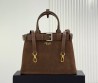 Женская замшевая сумка Prada коричневая с кожаными элементами 33х23 2025