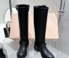 Женские кожаные сапоги Miu Miu черные с пряжками 2025