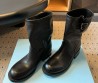 Женские кожаные укороченные сапоги Prada черные 2025