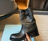Женские кожаные укороченные сапоги Prada черные 2025
