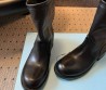 Женские кожаные укороченные сапоги Prada черные 2025