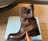 Женские кожаные укороченные сапоги Prada коричневые 2025