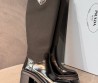 Женские кожаные сапоги Prada черные на каблуке 2025