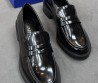Женские кожаные лоферы Stuart Weitzman черные лакированные 2025