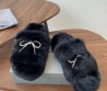 Женские меховые шлепанцы Balenciaga черные с бантом из страз 2025