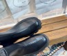 Женские кожаные ботинки Prada черные на толстой подошве 2025