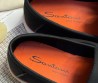 Мужские кожаные лоферы Santoni черные с оранжевым 2025