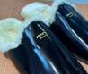 Женские кожаные мюли на меху Prada черные лаковые 2025