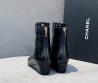 Женские кожаные ботильоны Chanel черные на танкетке 2025