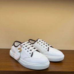 Женские кожаные кеды Louis Voitton белые с коричневой окантовкой 2025