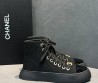 Женские текстильные кеды Chanel черные с лакированным носом 2025