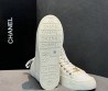 Женские текстильные кеды Chanel белые с лакированным носом 2025