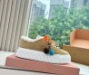 Женские замшевые кеды Miu Miu бежевые на овчине с цветными шнурками 2025