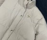 Женский пуховик Prada молочный 2025