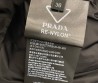 Женский пуховик Prada черный с прострочкой 2025