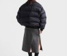 Женский пуховик Prada черный с прострочкой 2025