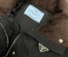 Женский пуховик Prada черный с прострочкой 2025