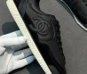 Женские кожаные кроссовки Chanel черные с лакированным носом 2025