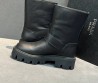 Женские кожаные сапоги Prada черные с пряжкой 2025