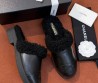 Женские кожаные мюли Chanel черные с мехом 2026
