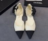 Женские кожаные балетки Chanel белые с черным с текстильным носом 2026
