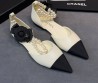 Женские кожаные балетки Chanel белые с черным с текстильным носом 2026