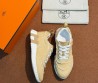 Женские текстильные кроссовки Hermes бежевые с бахромой 2026