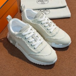 Женские текстильные кроссовки Hermes белые с бахромой 2026